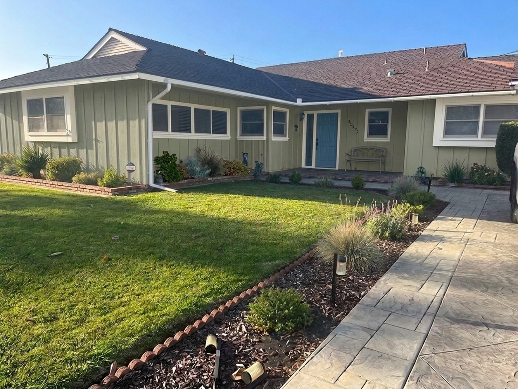 A home repainted in Clary Sage and Alabaster